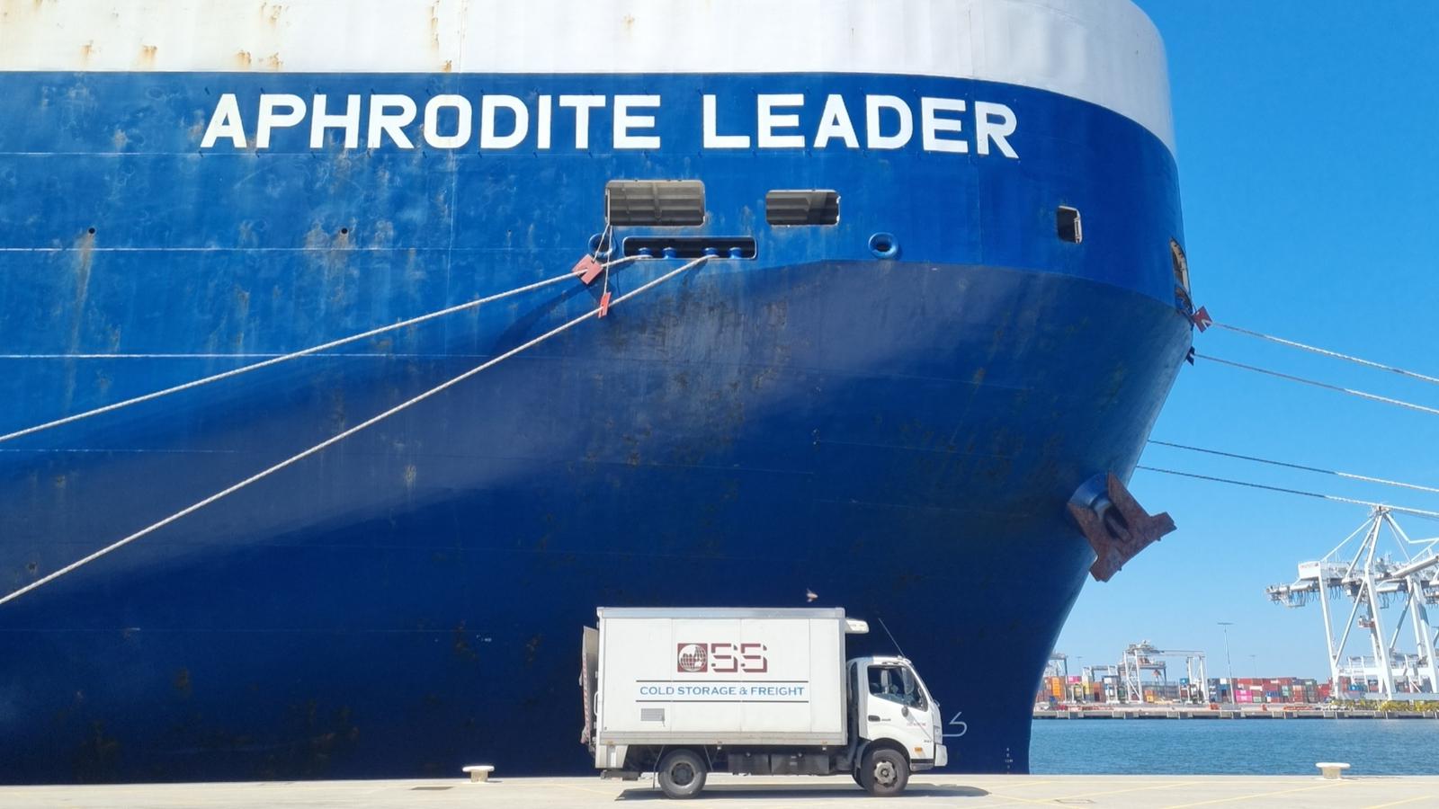 OSS Maritime delivery truck alongside the Aphrodite Leader at port