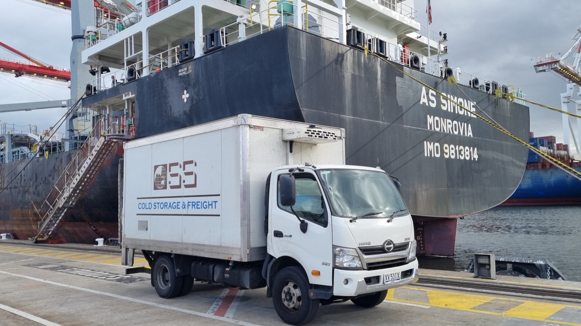 OSS Maritime Cold Storage truck next to the AS Simone